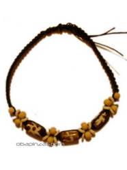 ZAS robapinzas.com | Tobillera algod&oacute;n encerado y cuentas en hueso, coco madera etc. Ideal para chicos.